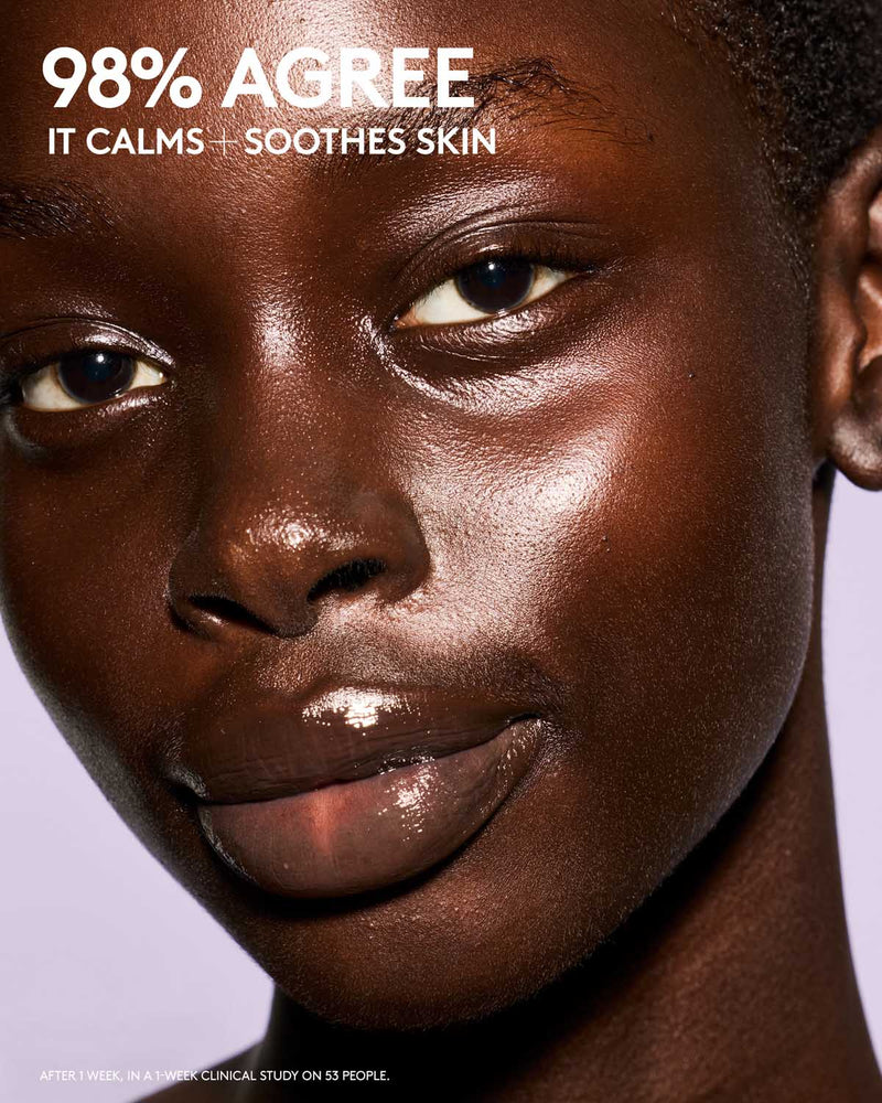 Close-up of a person's face with text indicating skin calming and soothing effects.