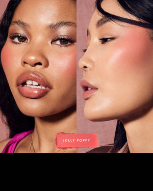 Model wearing Fenty Beauty Fenty Cheeks Suede Powder Blush in shade Lolly Polly.