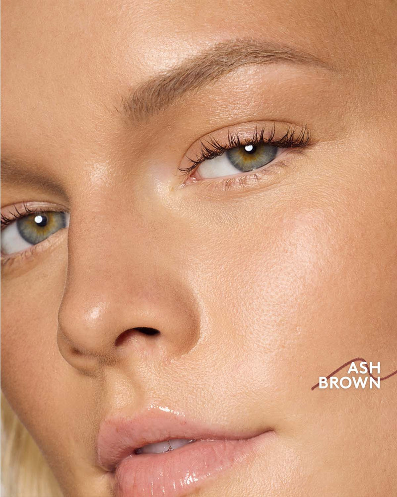 medium skin toned model wearing brow MVP in ash brown