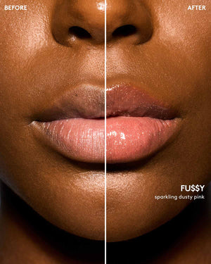 Deep skin tone model before and after using Gloss Bomb Oil Luminizing Oil and Gloss in shade Fussy.