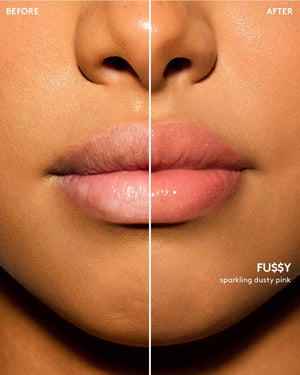 Deep skin tone model before and after using Gloss Bomb Oil Luminizing Oil and Gloss in shade Fussy.