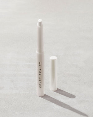 Open shot of Shadowstix Diamonds Diamond Veil Eyeshadow Stick in shade How Many Carats?! on a concrete background.
