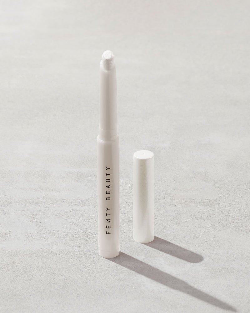 Open shot of Shadowstix Diamonds Diamond Veil Eyeshadow Stick in shade How Many Carats?! on a concrete background.