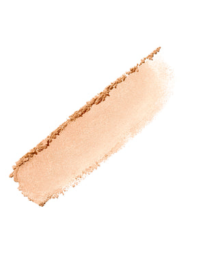 Product smear of Demi'glow Light-Diffusing Highlighter in shade Prosecco on a white background.