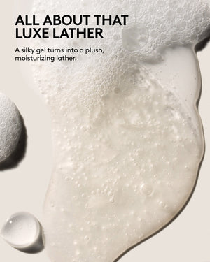 Dollop of Fenty Hair Moisture Rich Shampoo with text "All about that luxe lather. A silky gel turns into a plush moisturizing lather."