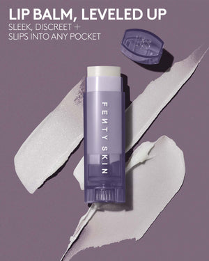 Infographic with lux balm lip balm on a smear texture and lavender background. Text reads lip balm, leveled up. Sleek, discreet + slips into any pocket.