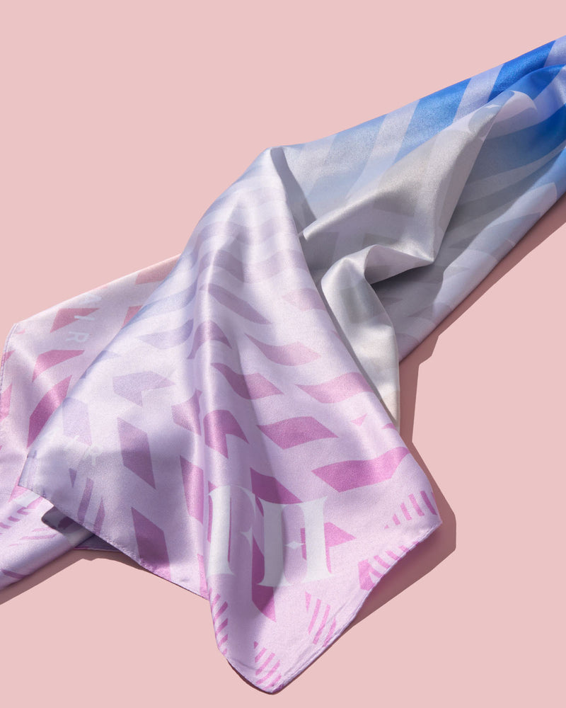 Fenty Hair multicolored Satin Scarf on a pink background.