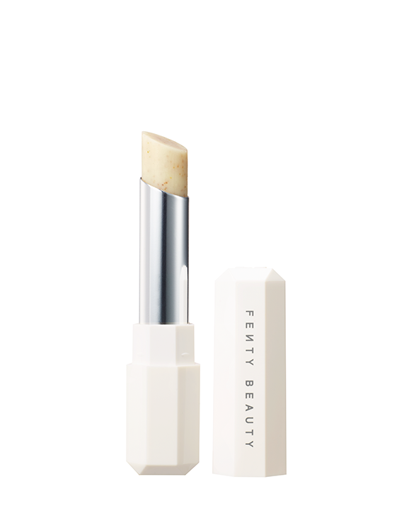 Pro Kiss'r Lip-Loving Scrubstick standing upright with the cap off and the lip scrub twisted up. Pro Kiss'r Lip-Loving Scrubstick standing upright with the cap off and the lip scrub twisted up.