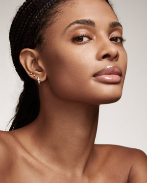 Portrait of model Alex wearing Invisimatte Instante Setting Blotting Powder.