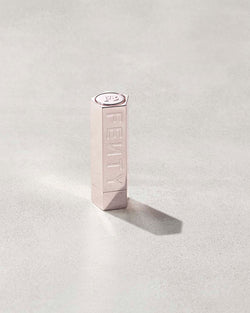 A Fenty Icon metallic refillable lipstick case.