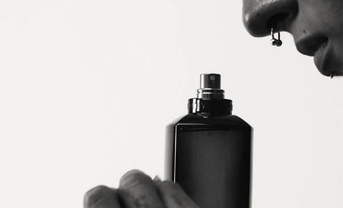 Model with septum ring sniffing Fenty Eau de Parfum.