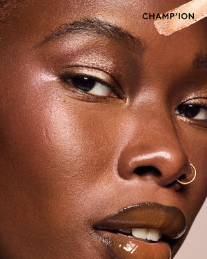 Model wearing Shadowstix Diamonds Diamond Veil  Eyeshadow Sticks in shade Champion.