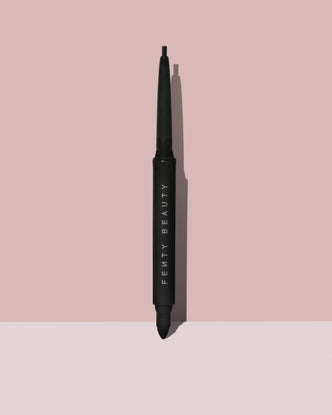 Fine Linez Lash Line-Enhancing Eyeliner in shade 'Cuz I'm Black' open capped product shot on a two-tone pink background.