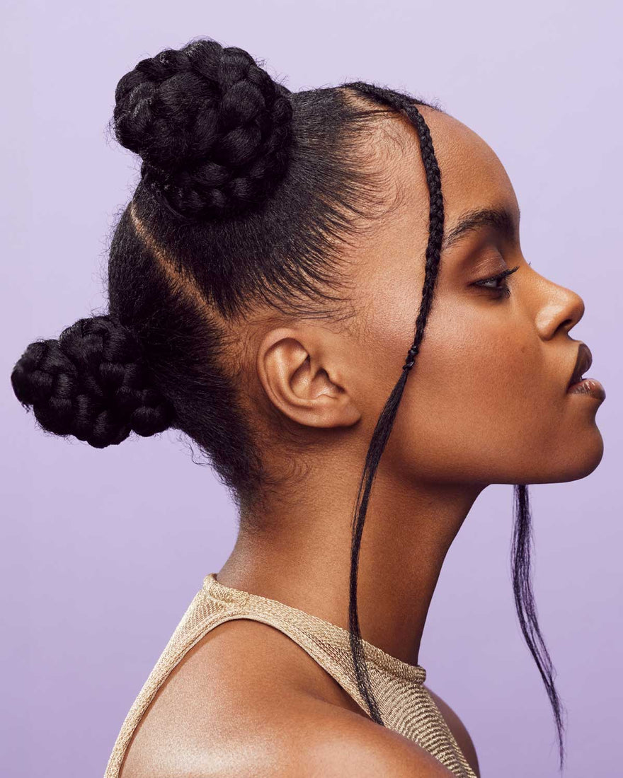 model with braided buns and and braided front pieces