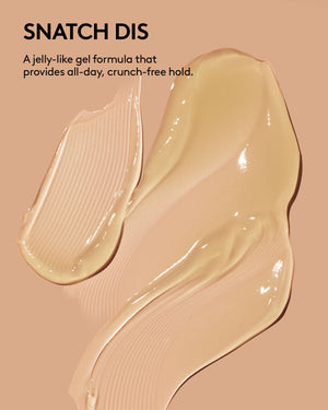 Dollop and smear of Fenty Hair The Gelly Type Strong Hold Gel on a peach colored background with the text, "Snatch Dis, a jelly-like gel formula that provides all-day, crunch-free hold.