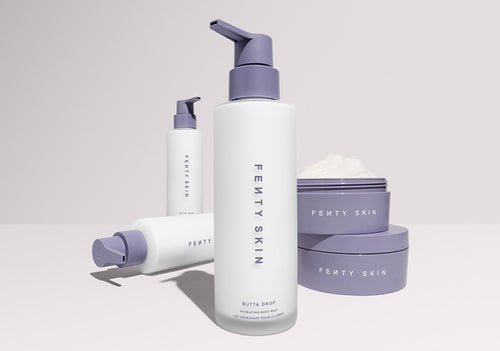 Product shot of Butta Drop Hydrating Body Milk and Butta Drop Body Cream on a white background.