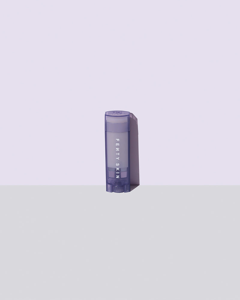 Lux balm product shot on a lavender background.