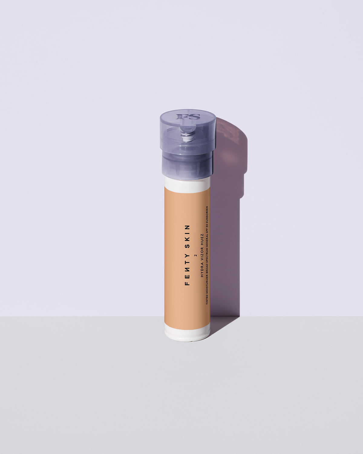 Hydra Vizor Hues tinted moisturizer sunscreen refill in shade 2 against a lavender background.