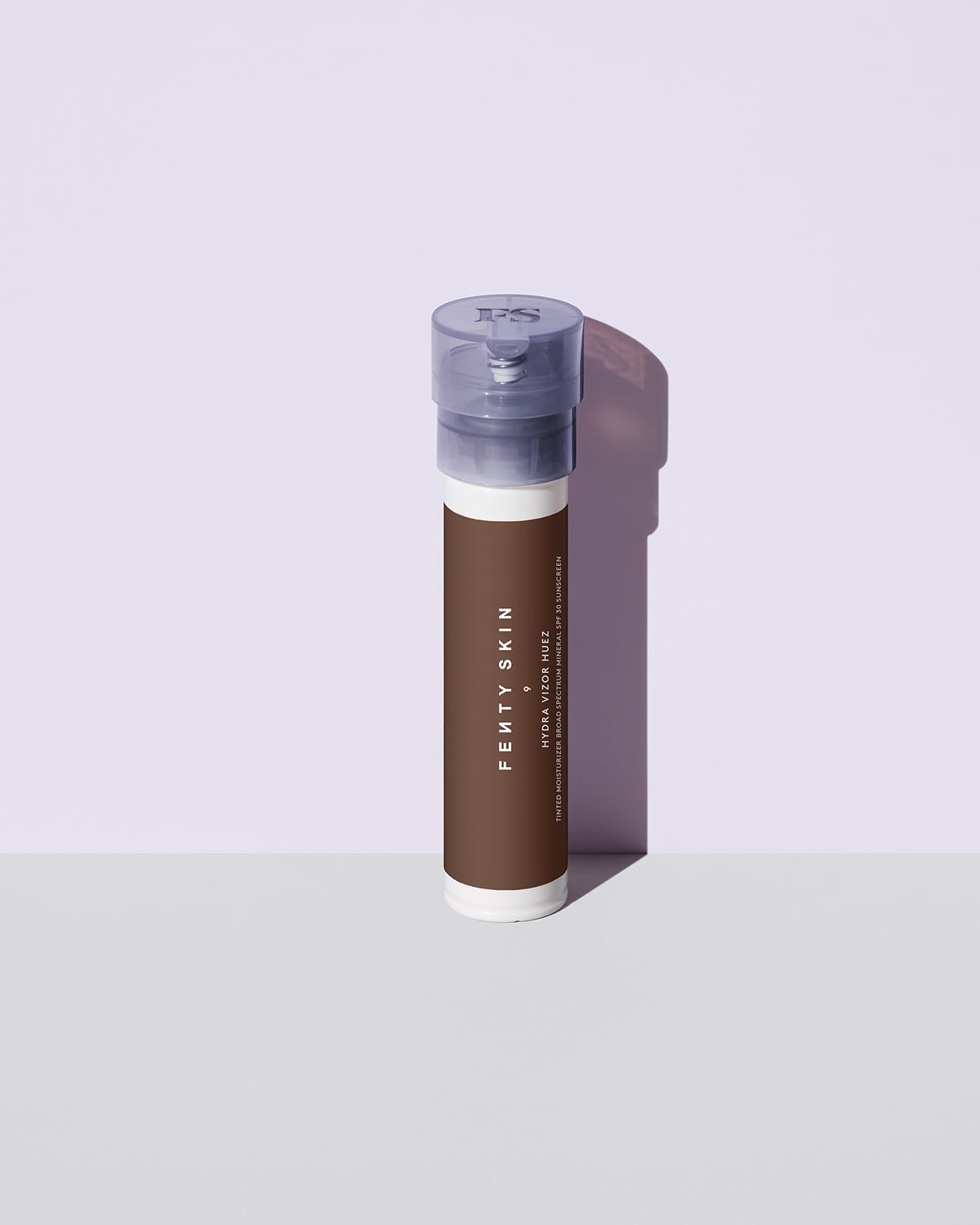 Hydra Vizor Hues tinted moisturizer sunscreen refill in shade 9 against a lavender background.