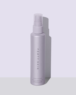 Fenty Skin bottle on a light gray background