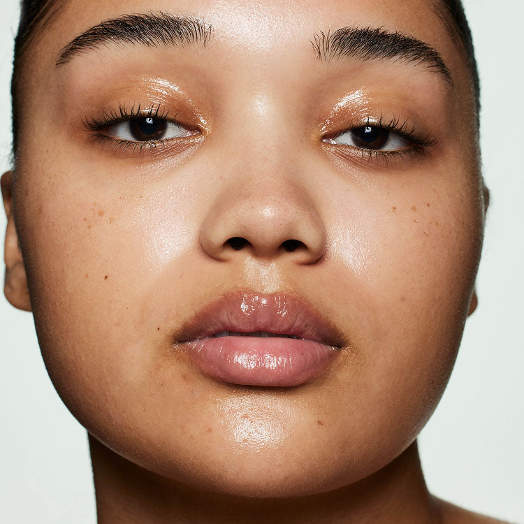 medium skin toned model with no makeup on