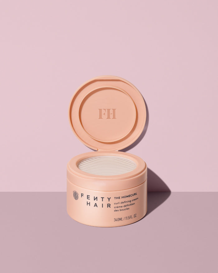 Open jar of Fenty Hair The Homecurl curl-defining cream