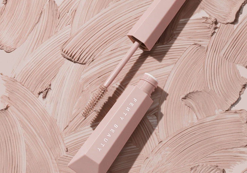 Open shot of Hella Extra Mascara Primer on a product texture background.
