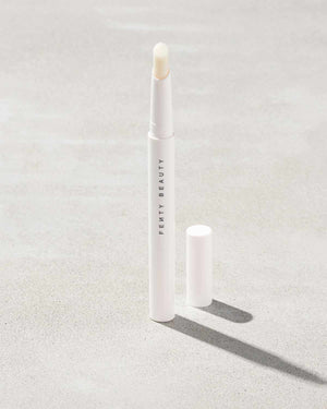 Brow MVP Sculpting Wax Pencil standing upright with the cap off and the brow wax twisted up.