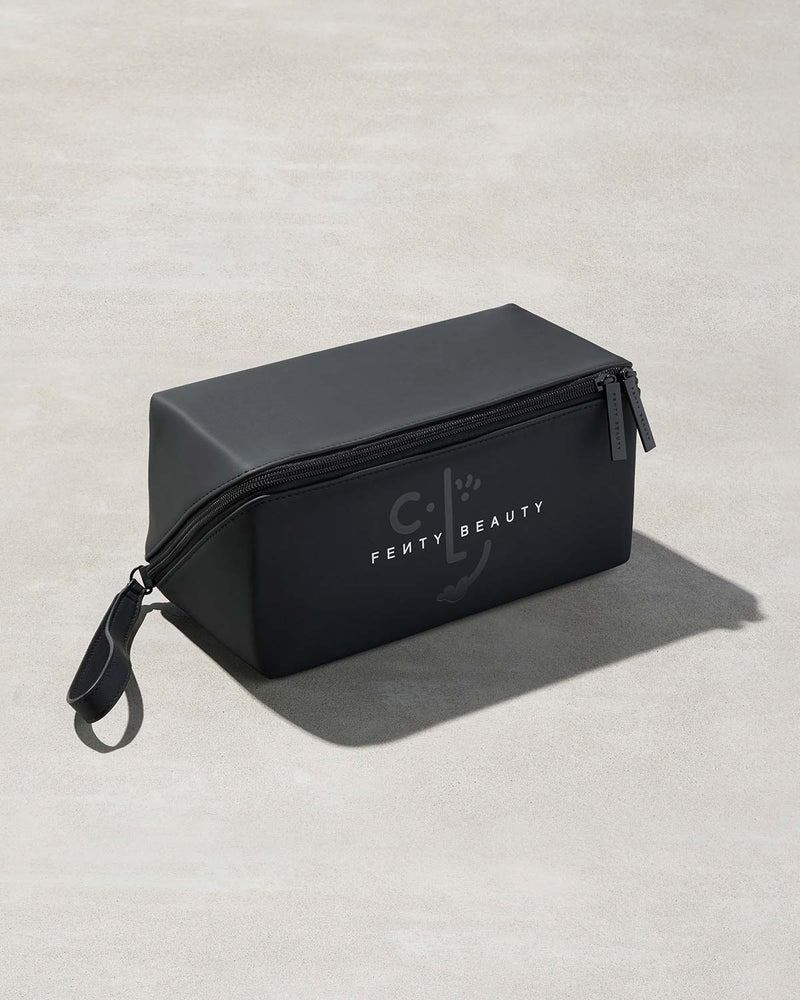 One black rectangular bag with Fenty branding on a gray background