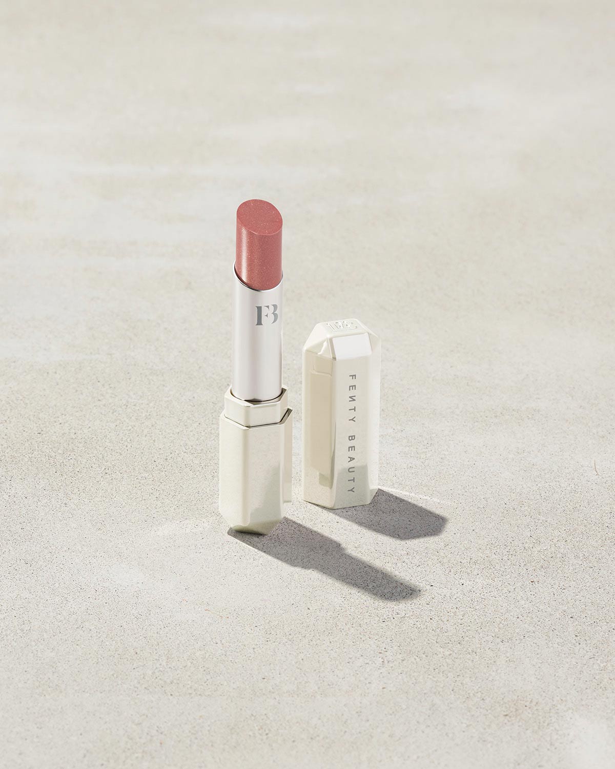 Slip Shine Sheer Shiny Lipstick shown in shade Glazed
