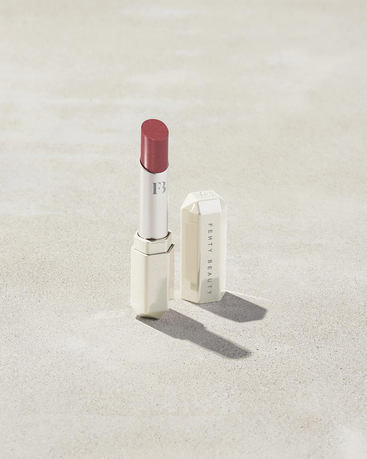 Slip Shine Sheer Shiny Lipstick shown in shade Goji Gang