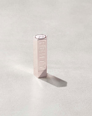 A Fenty Icon metallic refillable lipstick case.