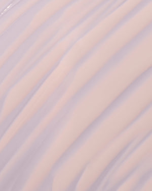 fat water milky smear on a lilac background