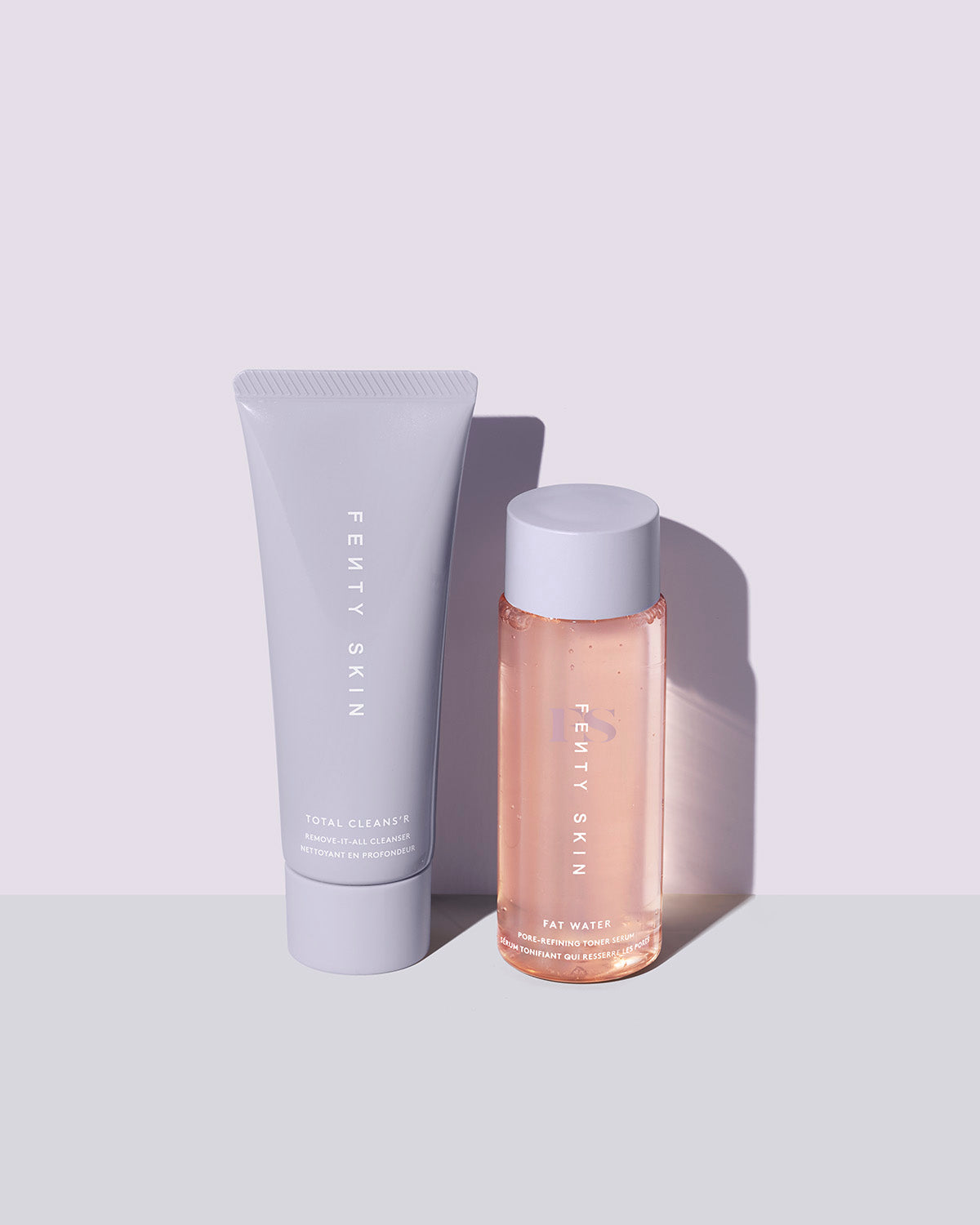 Fenty Skin The Daily Duo Mini Cleanser + Fat Water Toner Serum Duo on lavender background